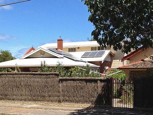 A House With Solar Panels Facing Different Directions