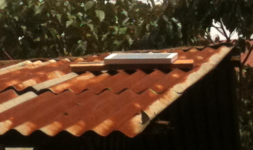 a solar panel on a Kenyan roof