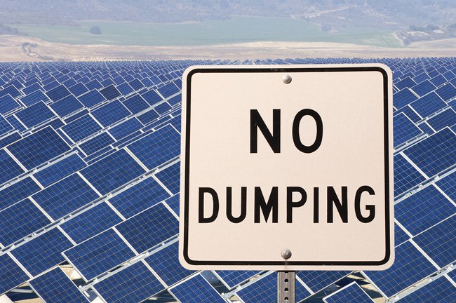 solar panels and a no dumping sign