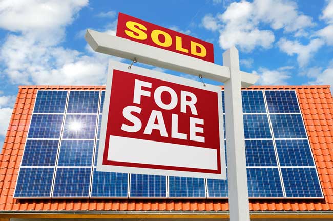 for sale sign and solar panels