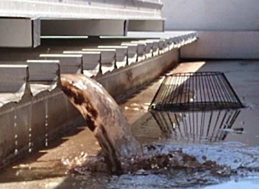 Flushing roof of debris