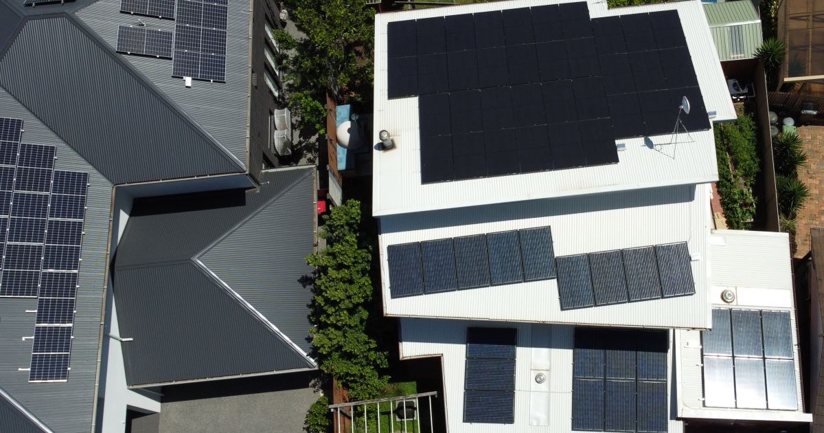 Drone shot of rooftop solar panel installation