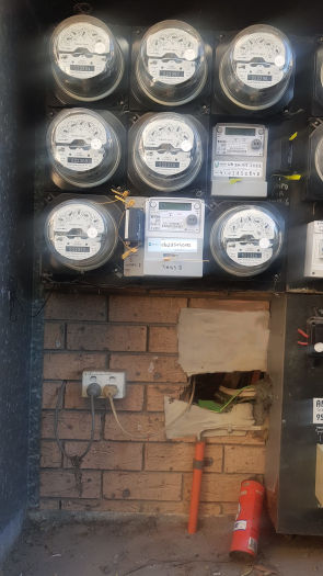 Electricity meter position with hole in the wall