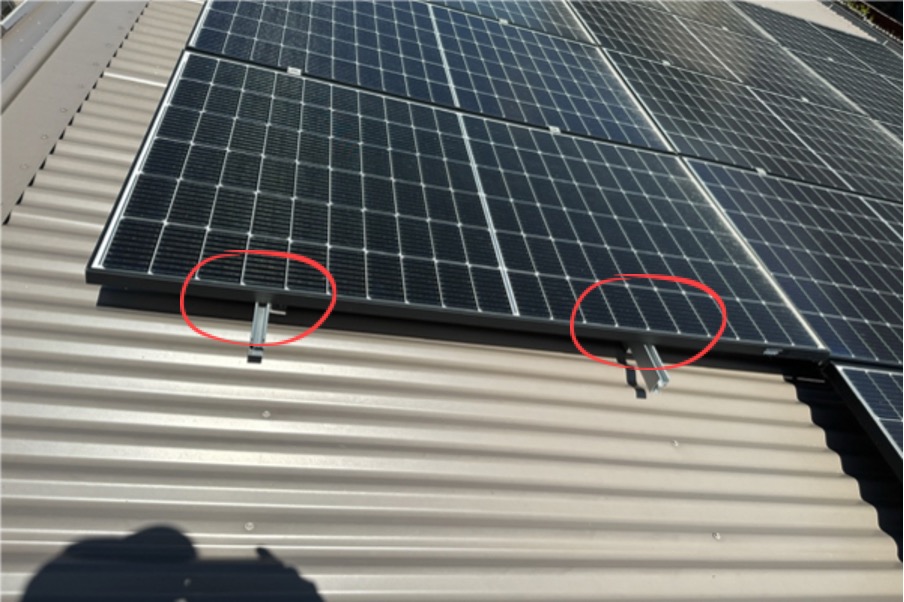missing end clamps on PV panel array