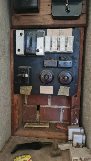 old asbestos electricity switchboard