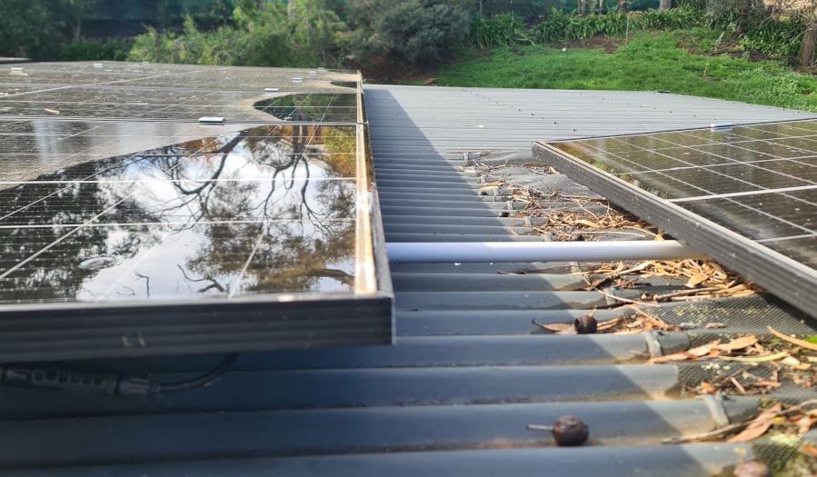 water pooled on solar panels