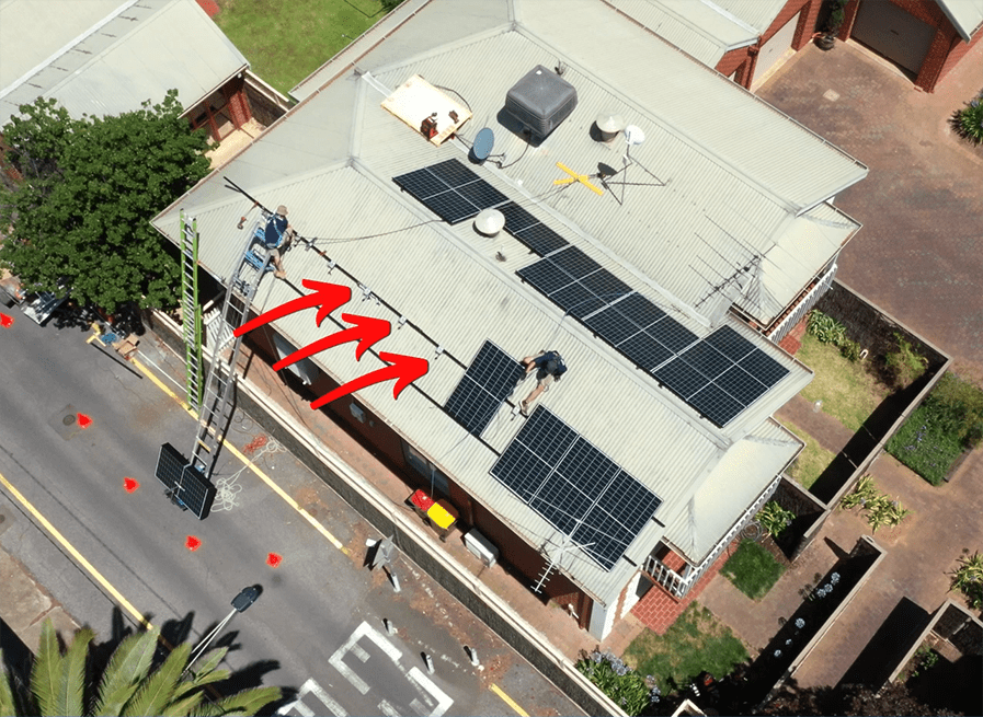 Drone shot of microinverters on roof