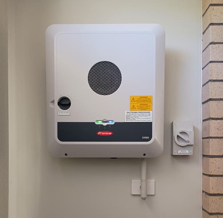 A Fronius Gen24 Primo inverter on a wall