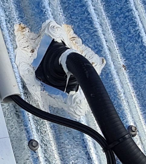 wiring conduit leaving a roof
