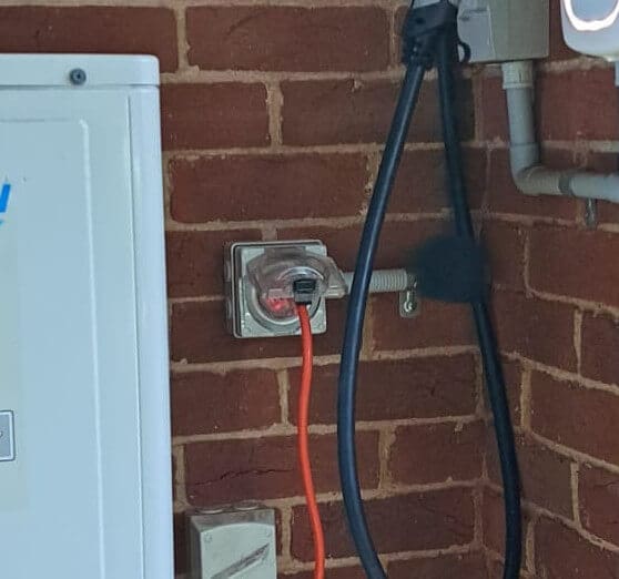 Power cord plugged into house