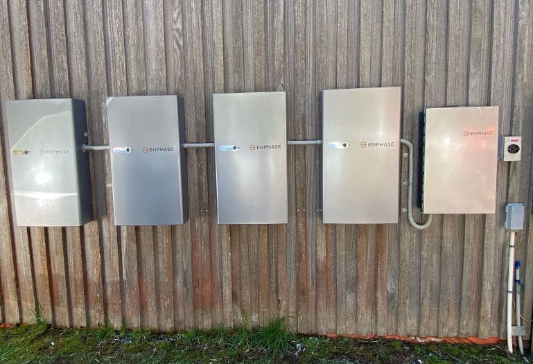Enphase 5p batteries on a wall