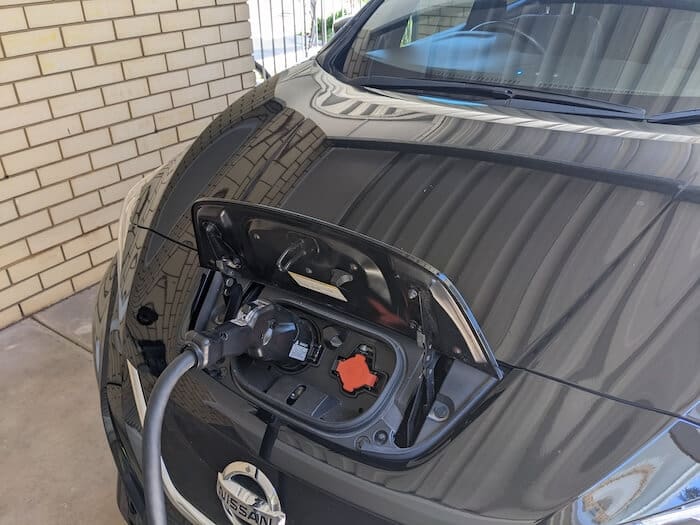 Nissan Leaf with charging cable.