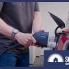A bidirectional V2G charger being plugged into an EV port