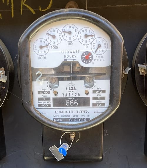 "Spinning disk" analog electricity meter.