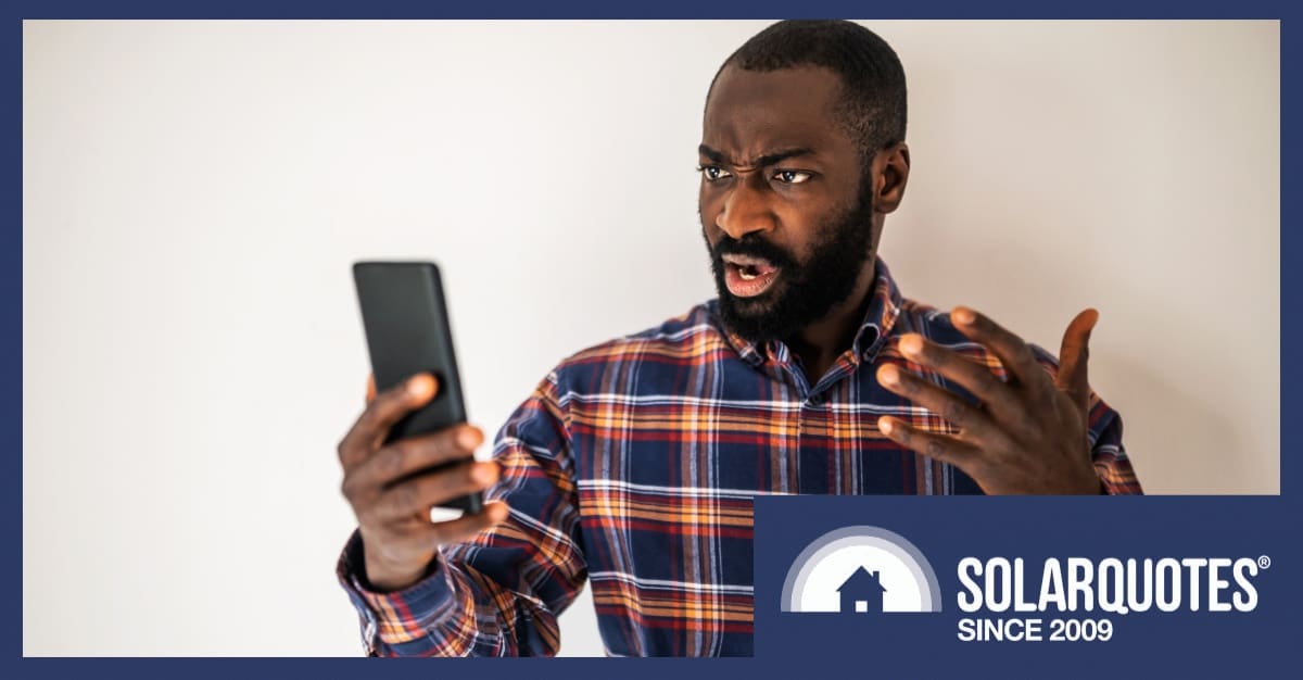 a man frustrated at his phone