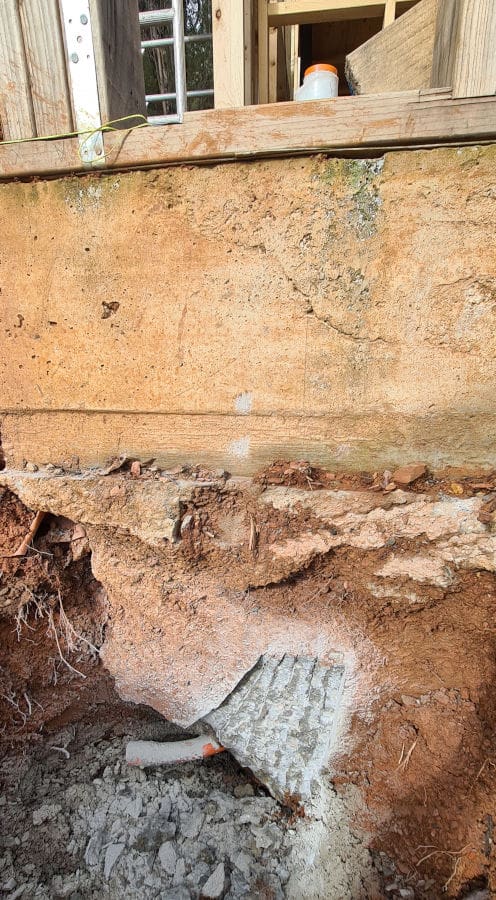 conduit through a concrete footing