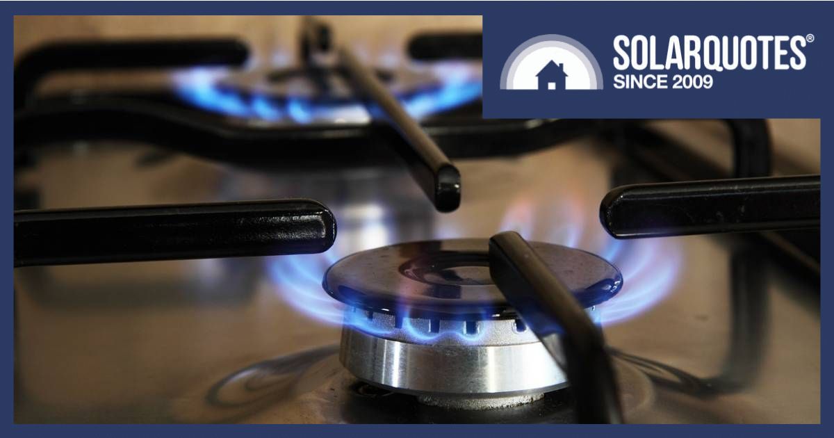 Close up on a gas burner with blue flame and the words SolarQuotes in the top right.