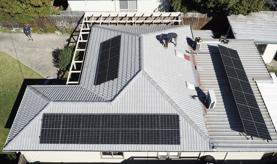 black framed solr panels on a roof