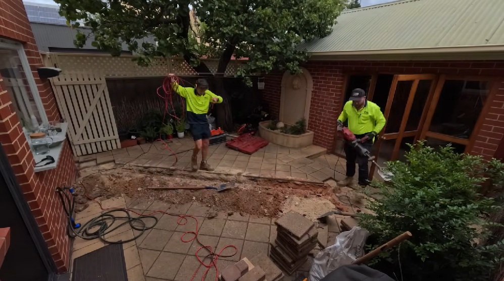EV charger cables being installed under ground